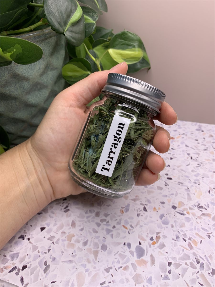A jar of dried tarragon.